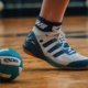 Best volleyball shoes for ankle support in blue and white on a volleyball court