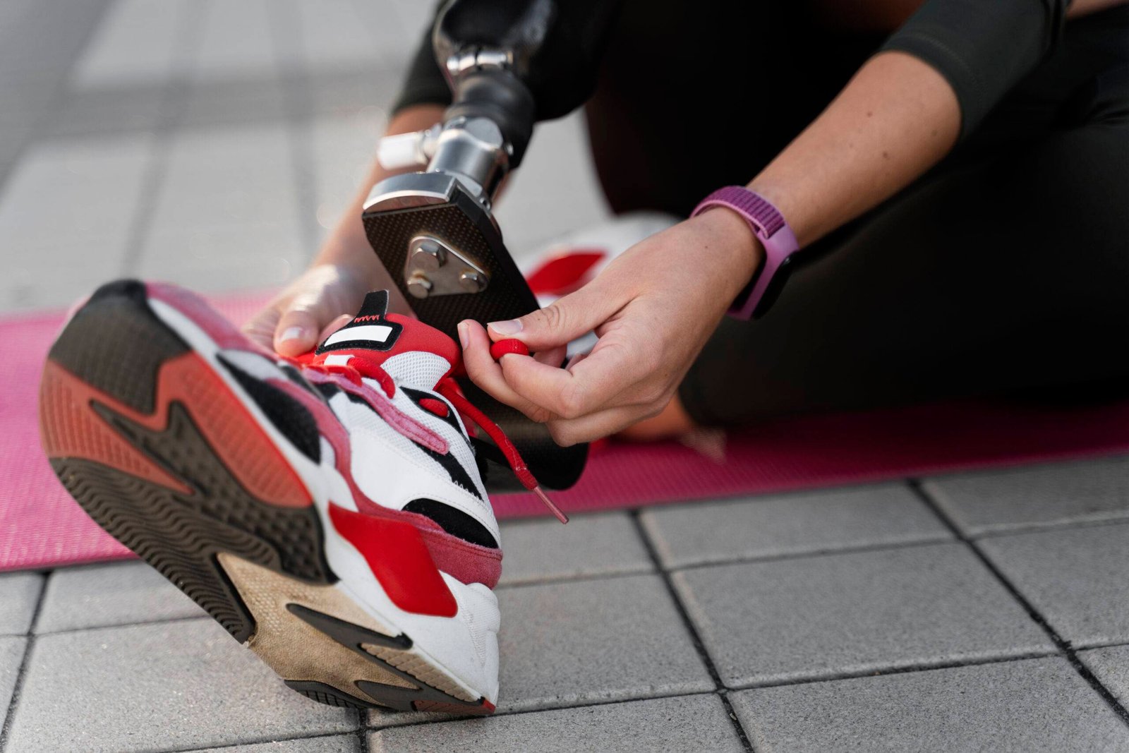 stylish sneakers with key features of volleyball shoe, worn by a man using gym equipment